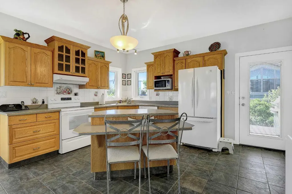 9009 128 Avenue Grande Prairie AB T8X 8C7