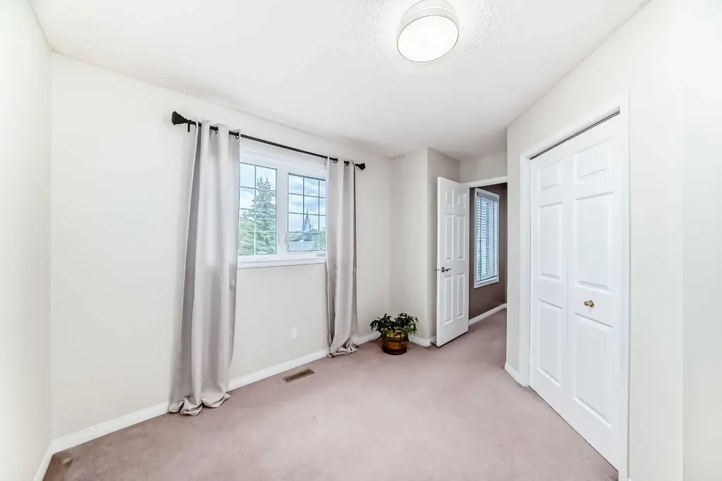 409 Rocky Ridge Bay NW Calgary AB T3G 4H8