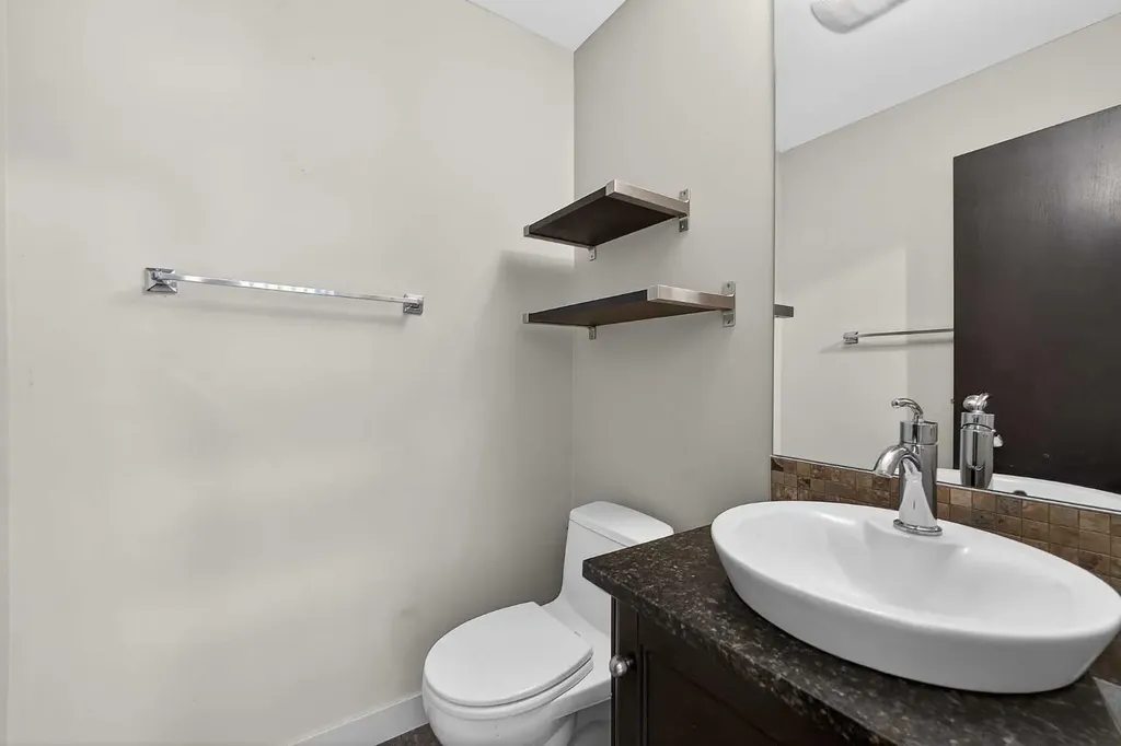 185 Woodridge Drive SW Calgary AB T2W 3X7