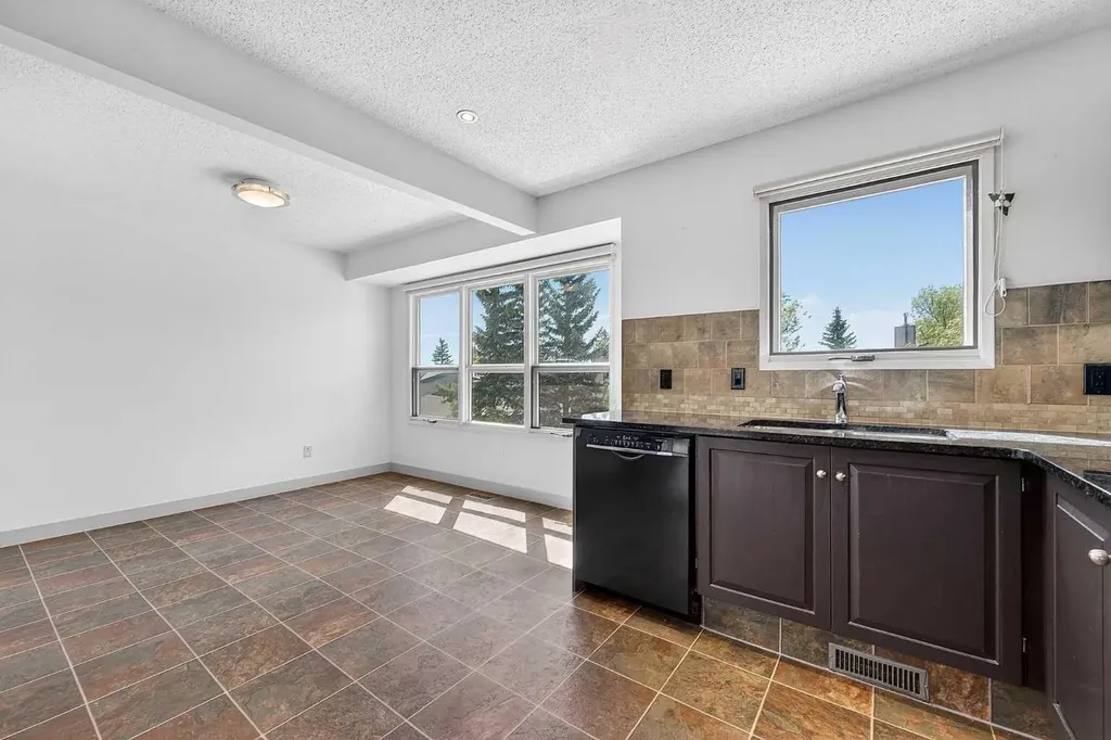 185 Woodridge Drive SW Calgary AB T2W 3X7