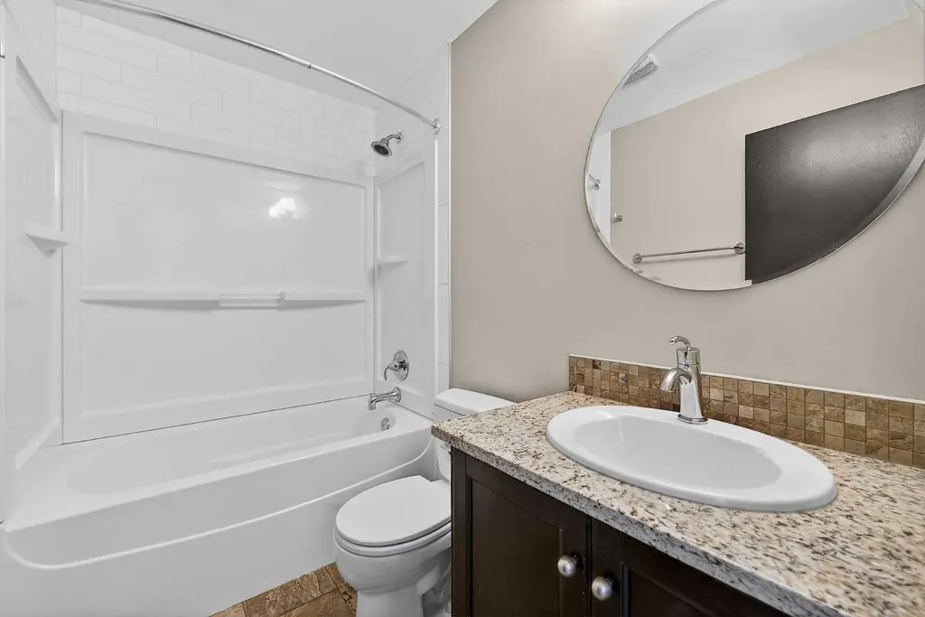 185 Woodridge Drive SW Calgary AB T2W 3X7