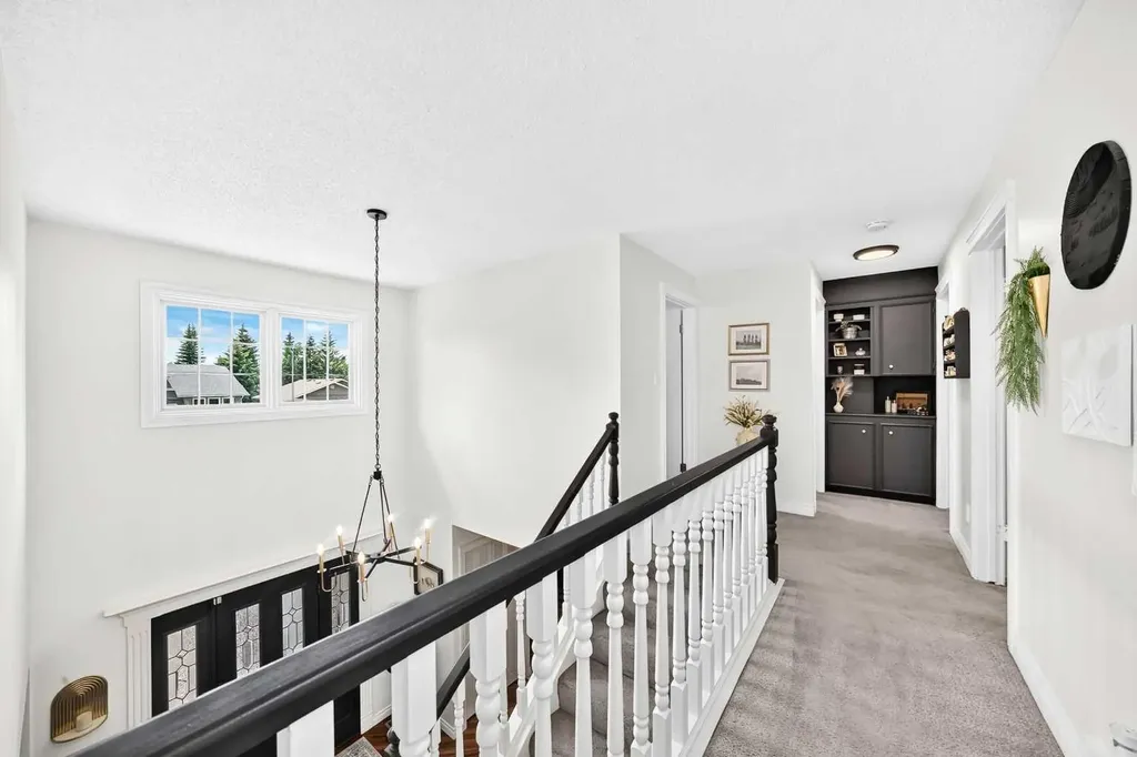 28 Woodmont Place SW Calgary AB T2W 4N3
