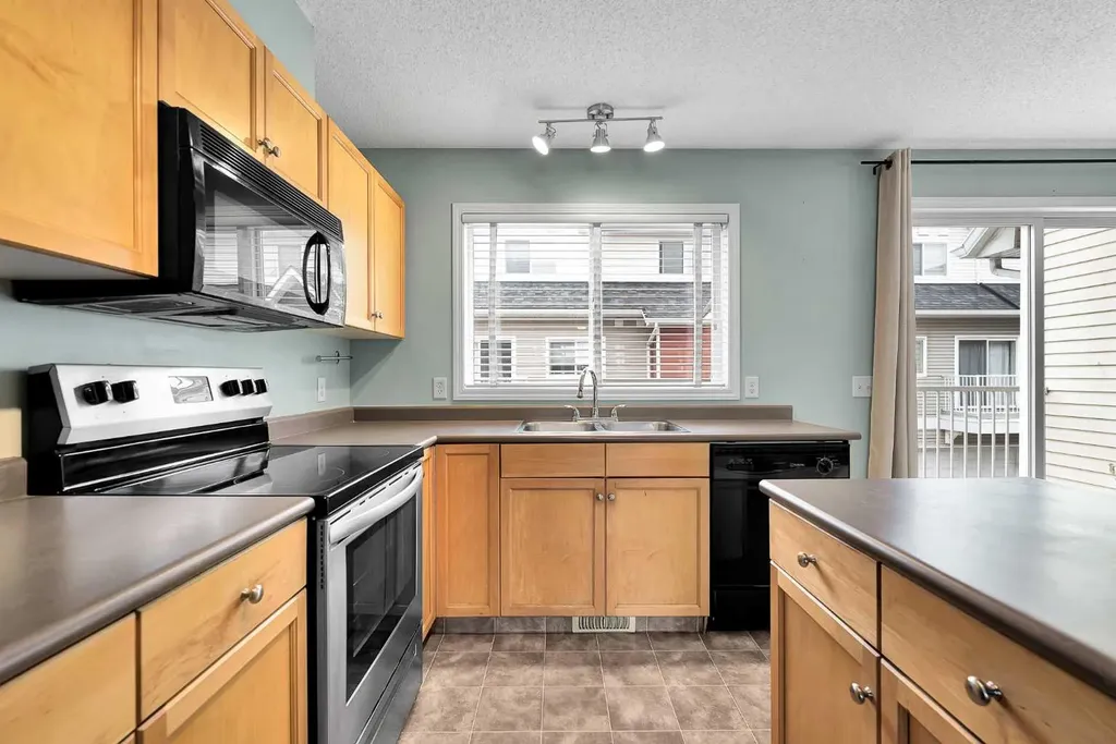 207 Mckenzie Towne Gate SE Calgary AB T2Z 4G2