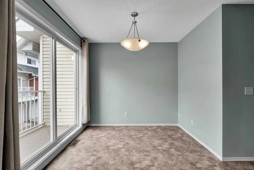 207 Mckenzie Towne Gate SE Calgary AB T2Z 4G2