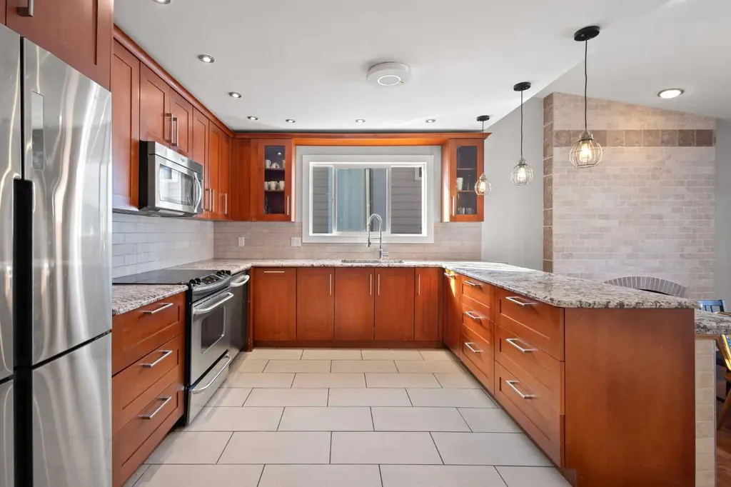 208 Woodpark Place SW Calgary AB T2M 2S5