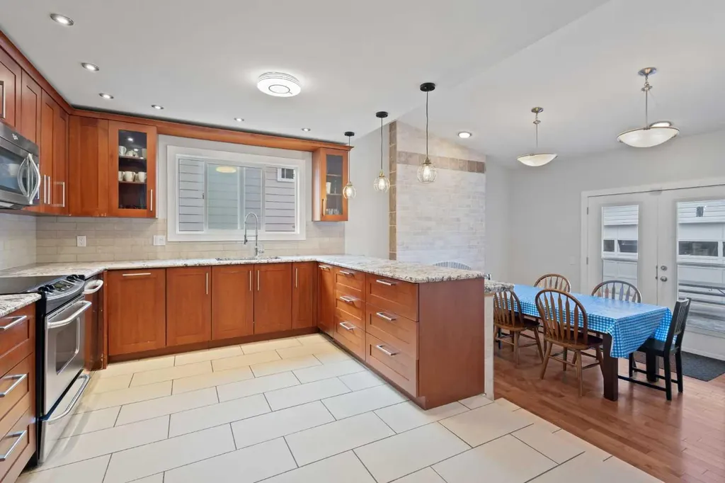 208 Woodpark Place SW Calgary AB T2M 2S5