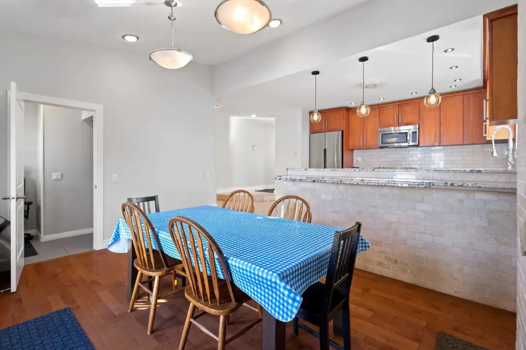 208 Woodpark Place SW Calgary AB T2M 2S5