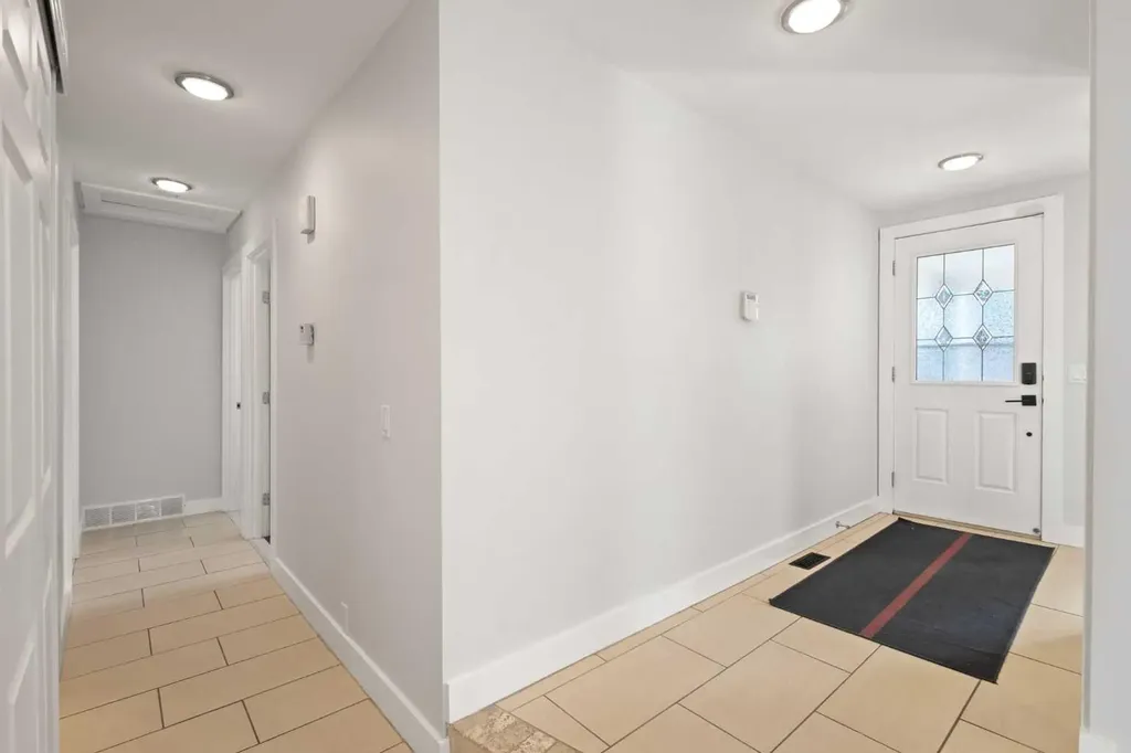 208 Woodpark Place SW Calgary AB T2M 2S5