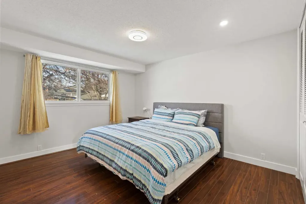 208 Woodpark Place SW Calgary AB T2M 2S5