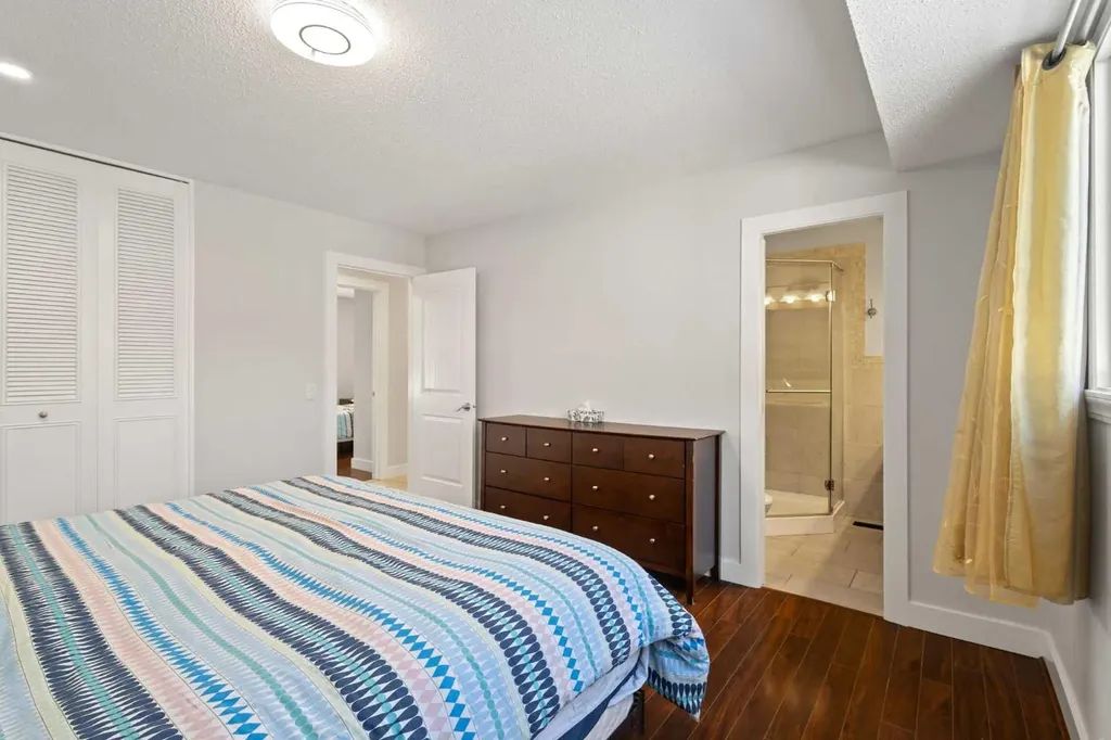 208 Woodpark Place SW Calgary AB T2M 2S5