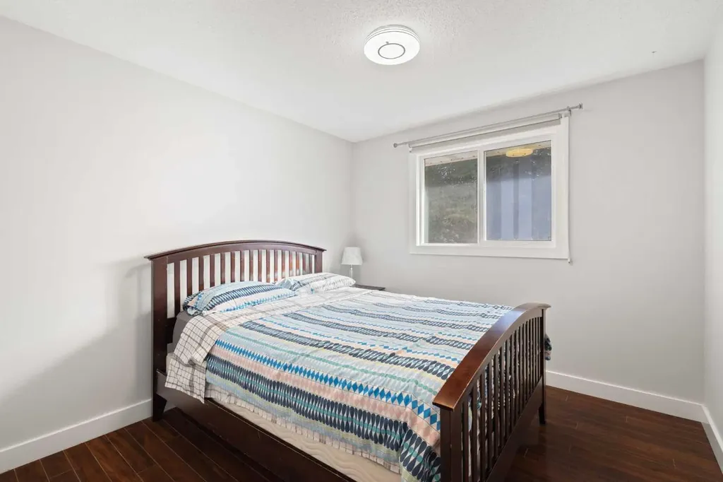 208 Woodpark Place SW Calgary AB T2M 2S5