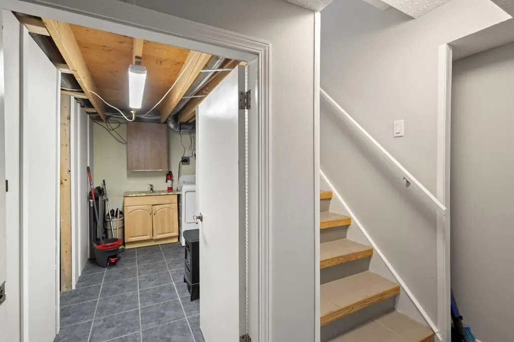 208 Woodpark Place SW Calgary AB T2M 2S5