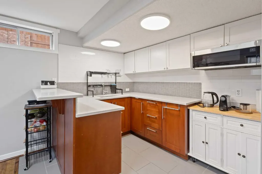 208 Woodpark Place SW Calgary AB T2M 2S5