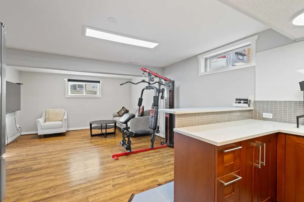 208 Woodpark Place SW Calgary AB T2M 2S5