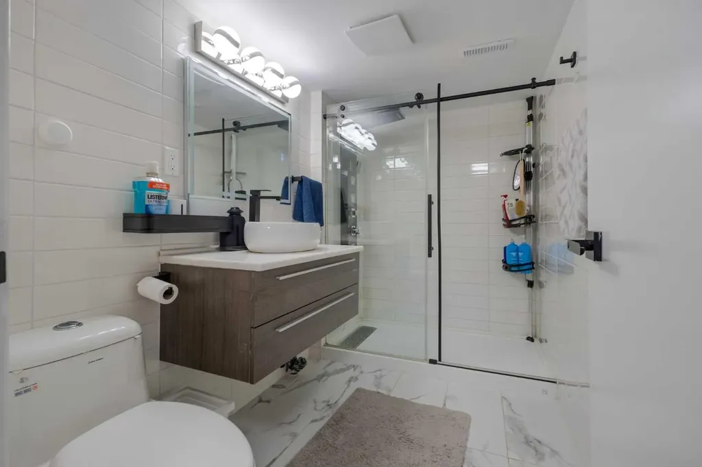 208 Woodpark Place SW Calgary AB T2M 2S5
