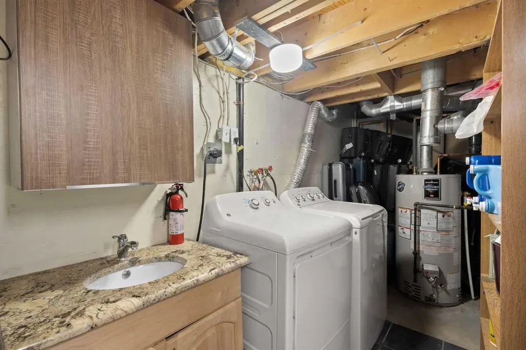 208 Woodpark Place SW Calgary AB T2M 2S5