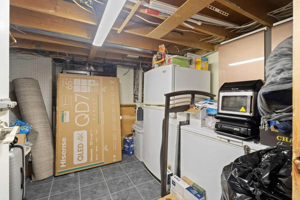 208 Woodpark Place SW Calgary AB T2M 2S5