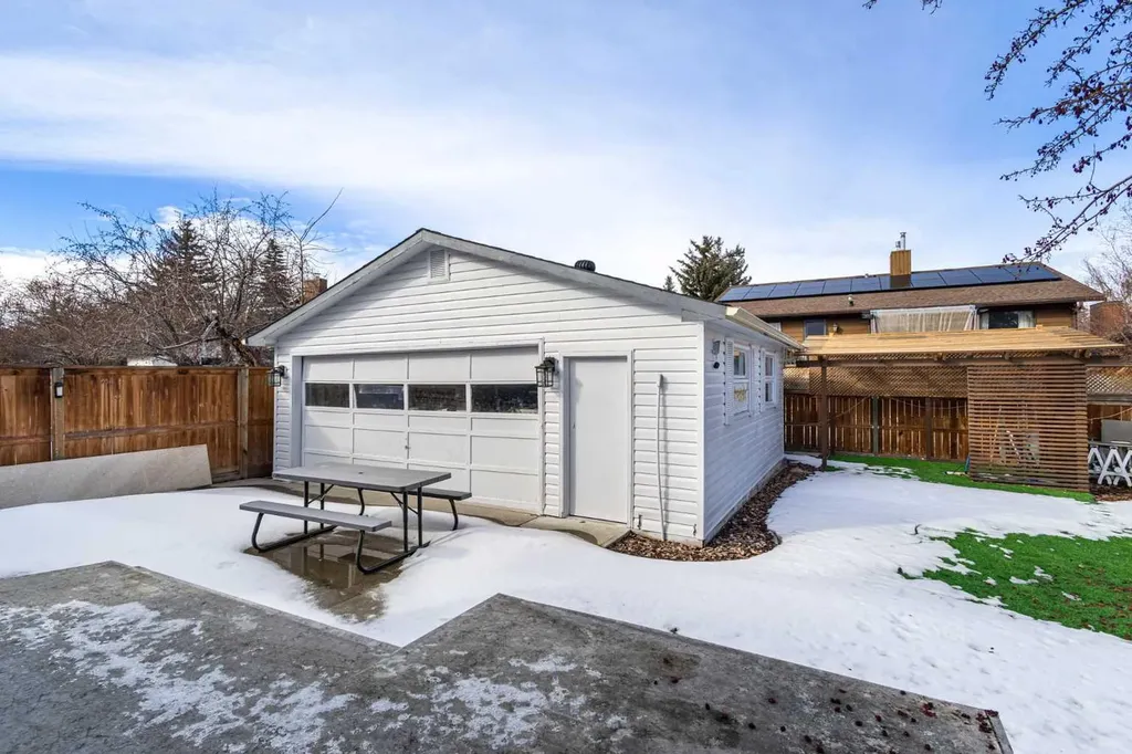 208 Woodpark Place SW Calgary AB T2M 2S5
