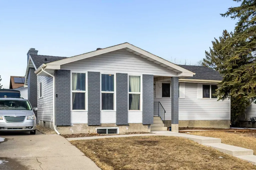 208 Woodpark Place SW Calgary AB T2M 2S5