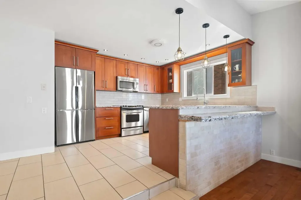 208 Woodpark Place SW Calgary AB T2M 2S5
