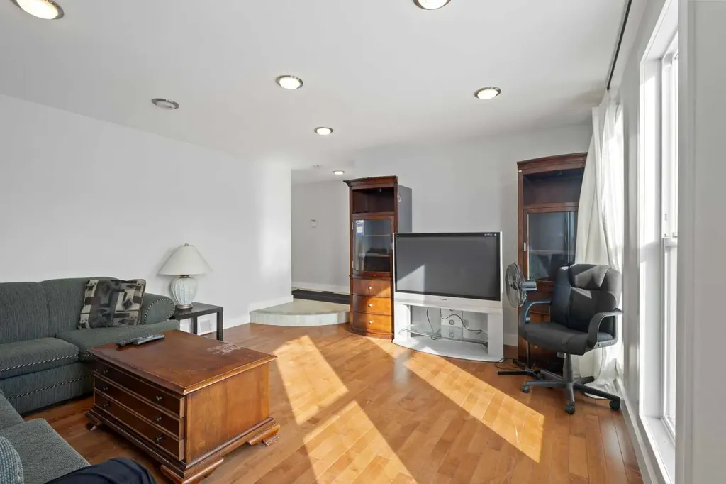 208 Woodpark Place SW Calgary AB T2M 2S5