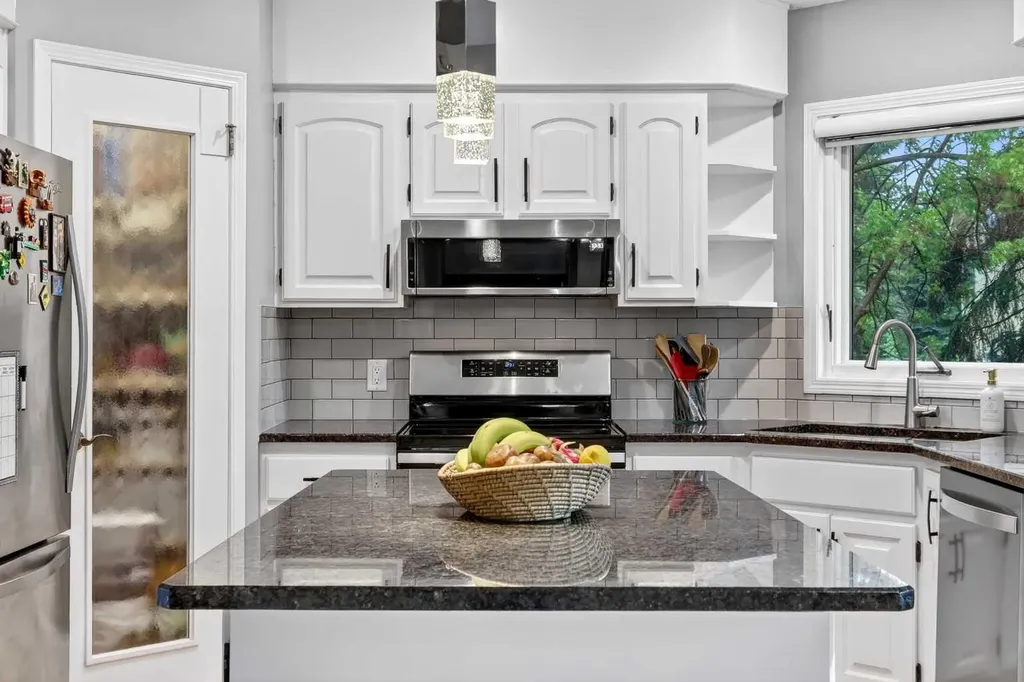 115 Woodpark Terrace SW Calgary AB T2W 6E7