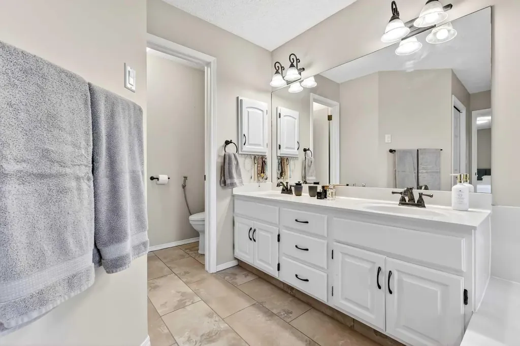115 Woodpark Terrace SW Calgary AB T2W 6E7