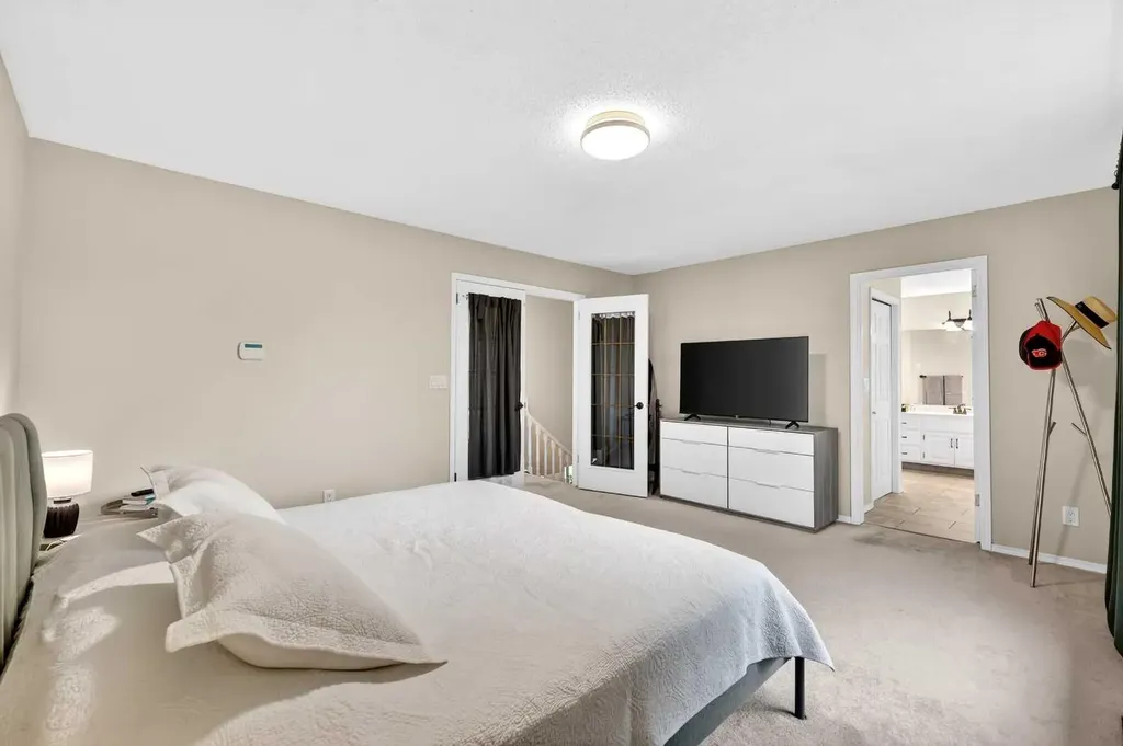 115 Woodpark Terrace SW Calgary AB T2W 6E7