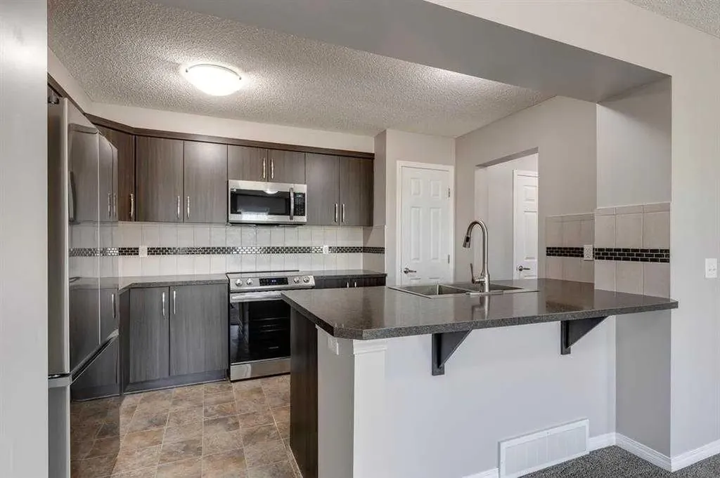 113 Windstone Avenue SW Airdrie AB T4B 3R3