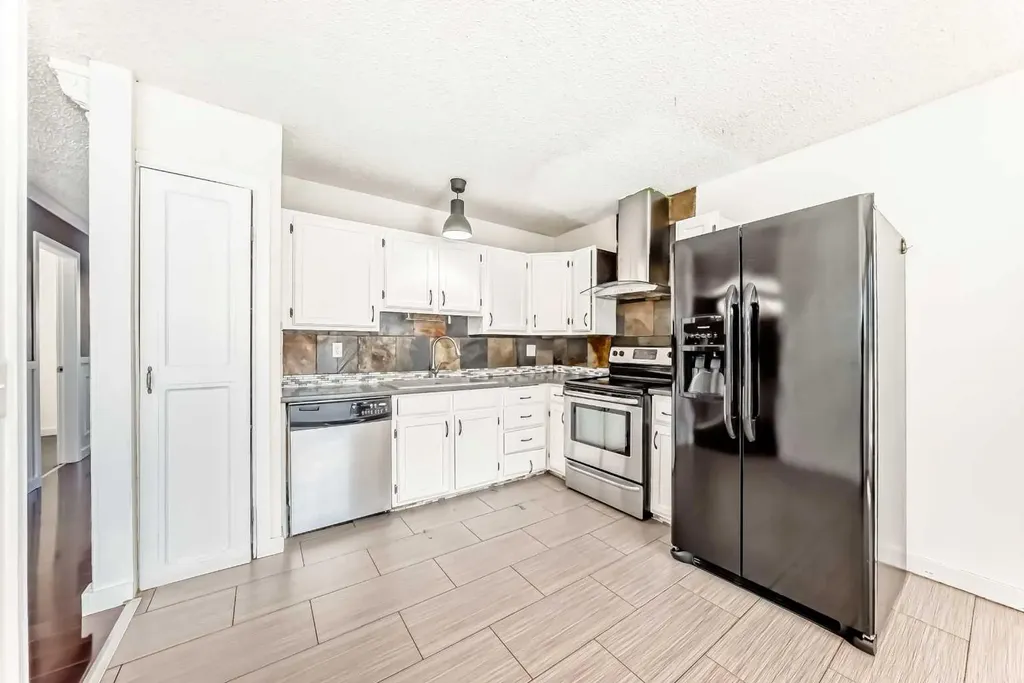 4208 58 Street NE Calgary AB T1Y 4E9