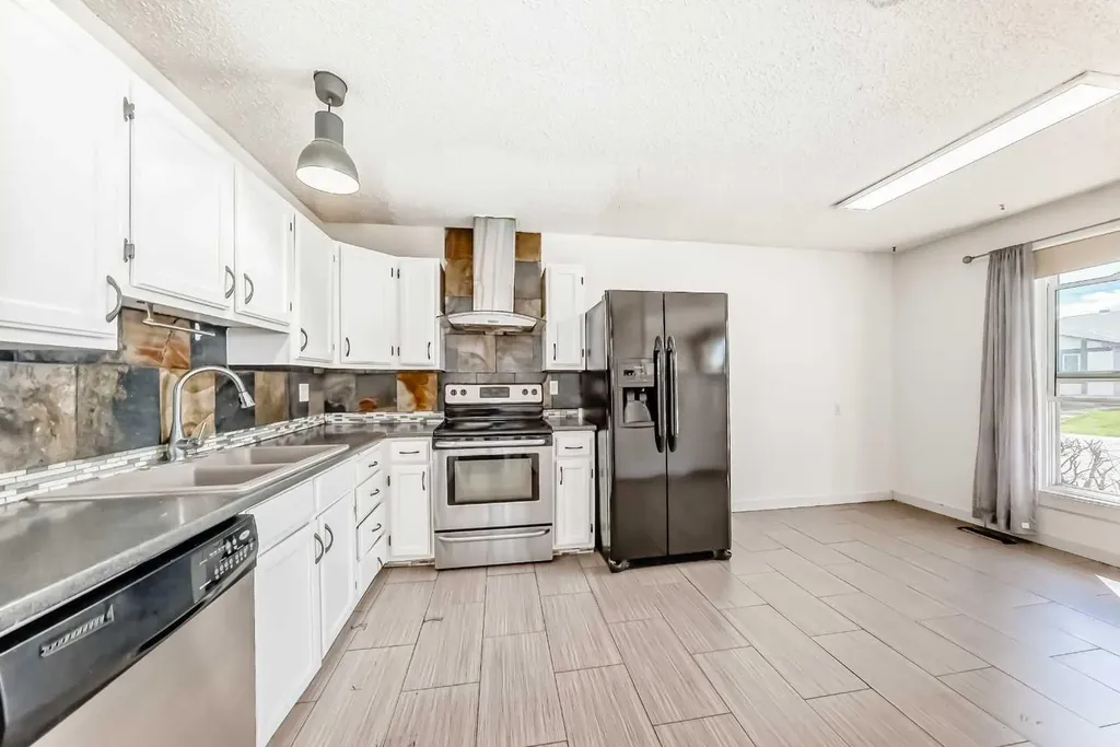 4208 58 Street NE Calgary AB T1Y 4E9