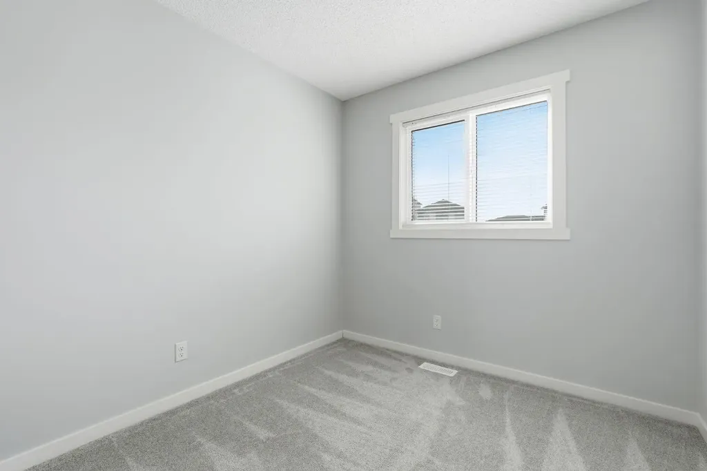 141 Belmont Drive SW Calgary AB T2X4Z7
