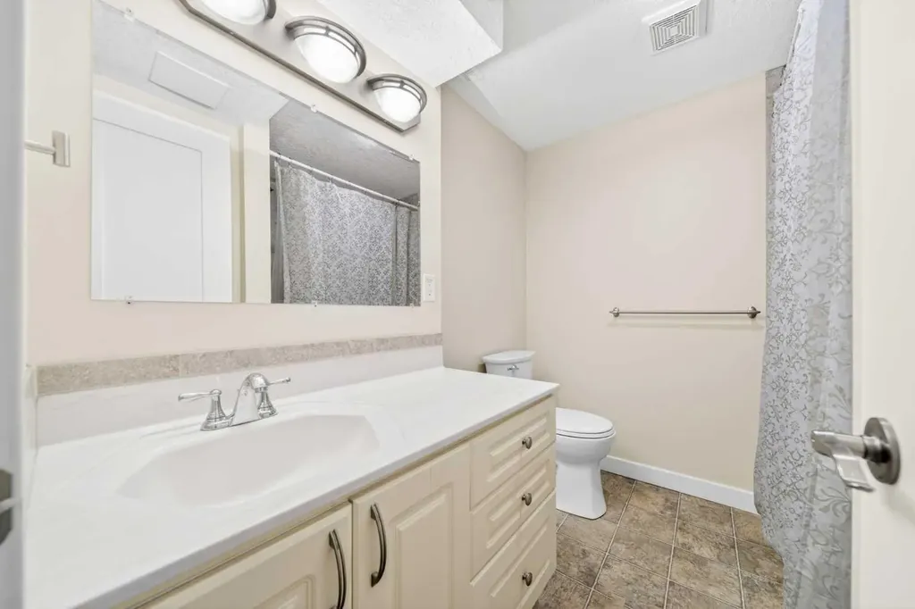 1728 Lake Bonavista Drive SE Calgary AB T2J 3B5