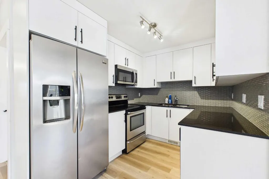 67 West Coach Manor SW Calgary AB T3H 1R7