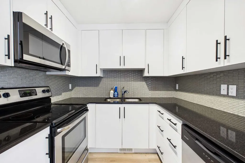 67 West Coach Manor SW Calgary AB T3H 1R7