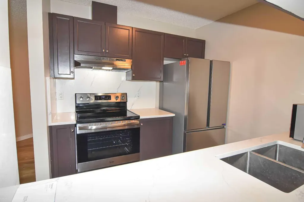 2022 Canyon Meadows Drive SE Calgary AB T2J 7H1