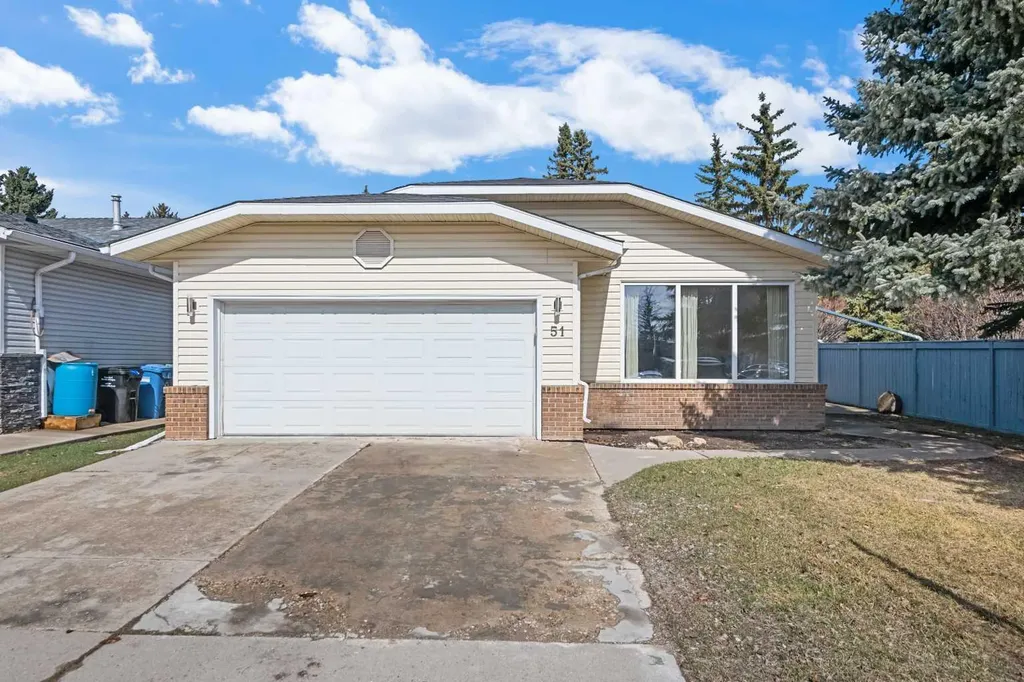 51 Woodmont Road SW Calgary AB T2W 4L6
