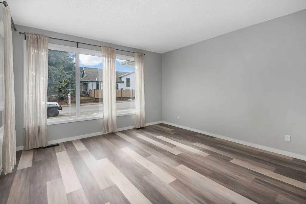 51 Woodmont Road SW Calgary AB T2W 4L6