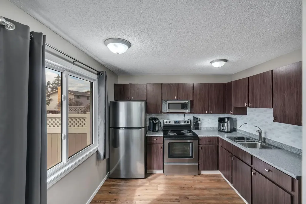 174 Woodmont Terrace SW Calgary AB T2W 4Z4