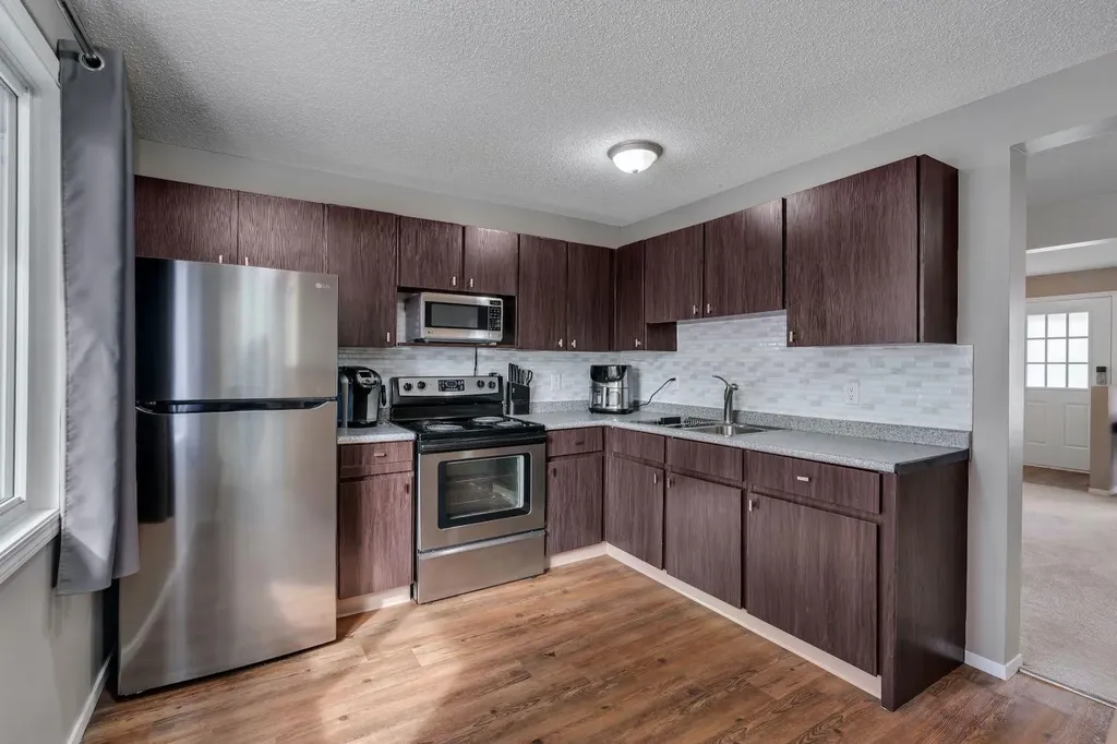 174 Woodmont Terrace SW Calgary AB T2W 4Z4