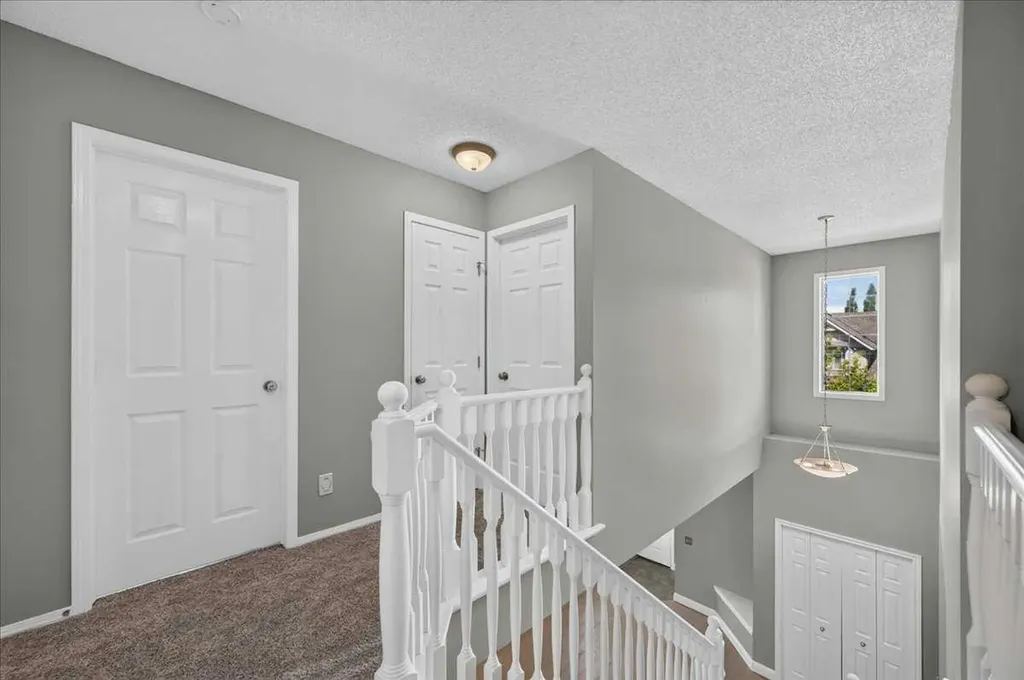 99 Evansbrooke Manor NW Calgary AB T2P 1C9