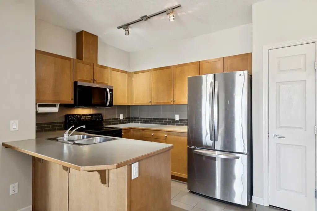 92 Crystal Shores Road Okotoks AB T1S 2N2