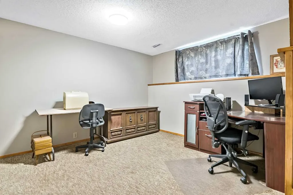 323 Woodvale Crescent SW Calgary AB T2W 3L3