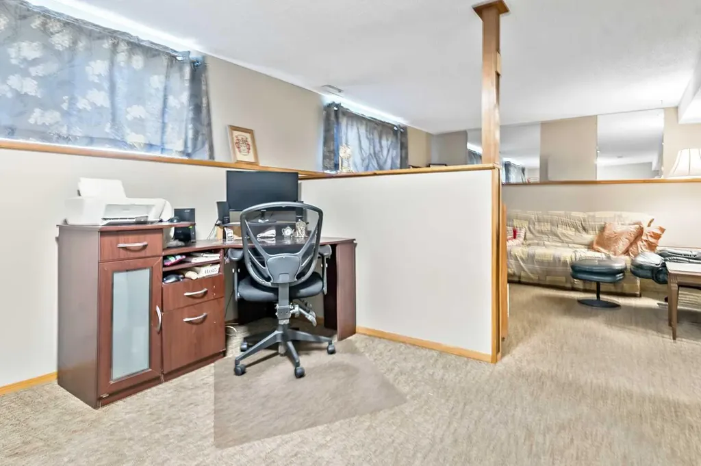 323 Woodvale Crescent SW Calgary AB T2W 3L3