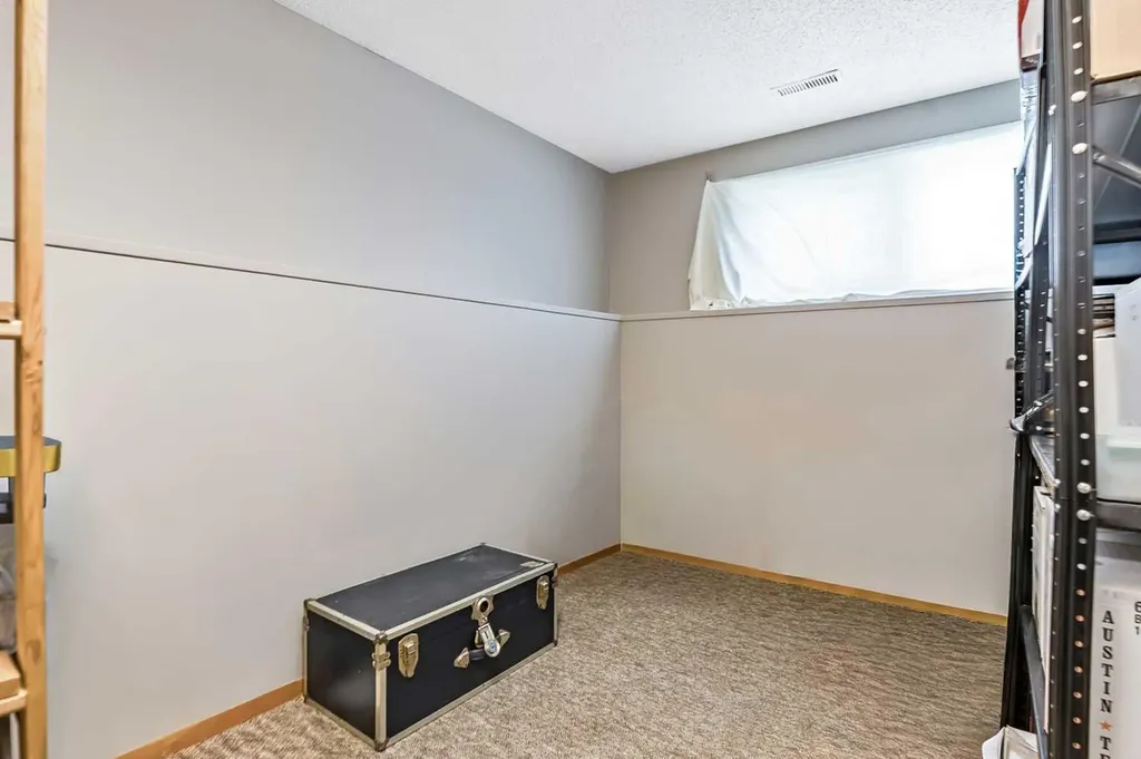 323 Woodvale Crescent SW Calgary AB T2W 3L3