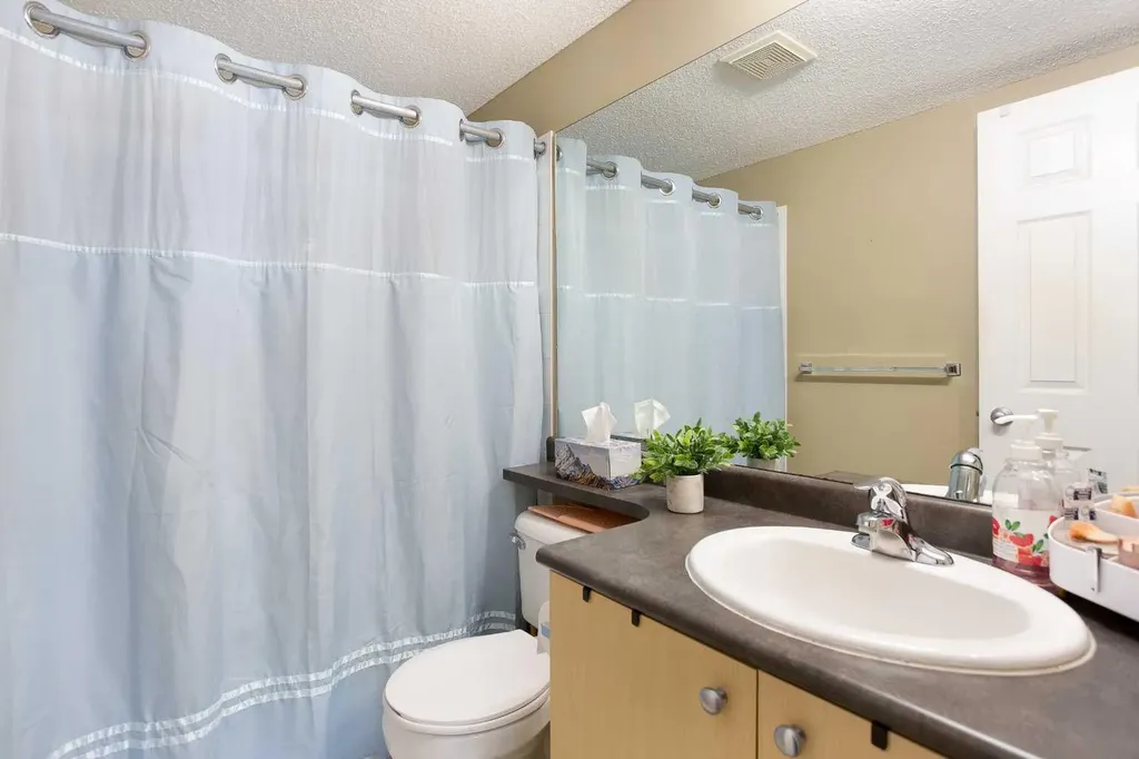 304 Mackenzie Way SW Airdrie AB T4B 3H6
