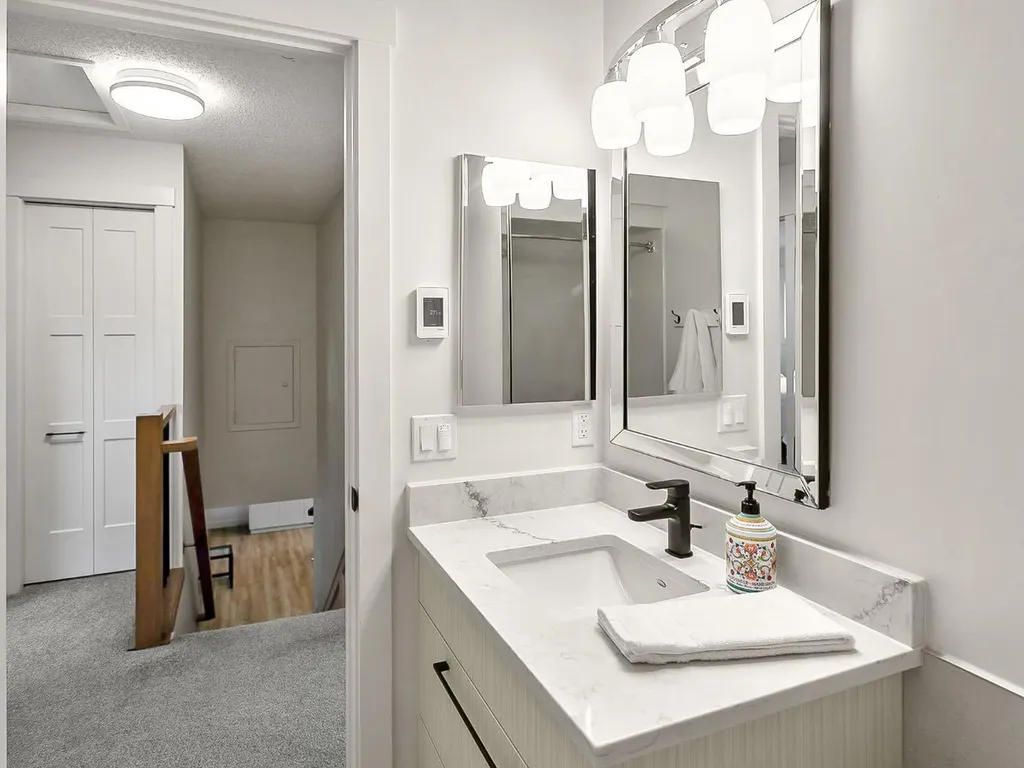 75 Woodacres Crescent SW Calgary AB T2W 4V5