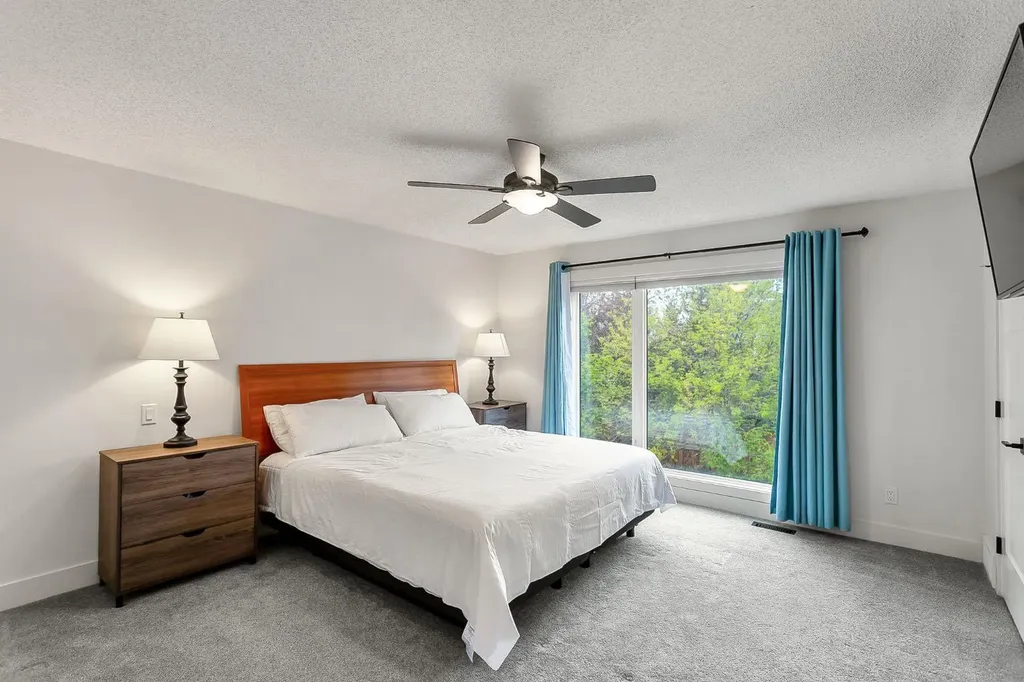 75 Woodacres Crescent SW Calgary AB T2W 4V5