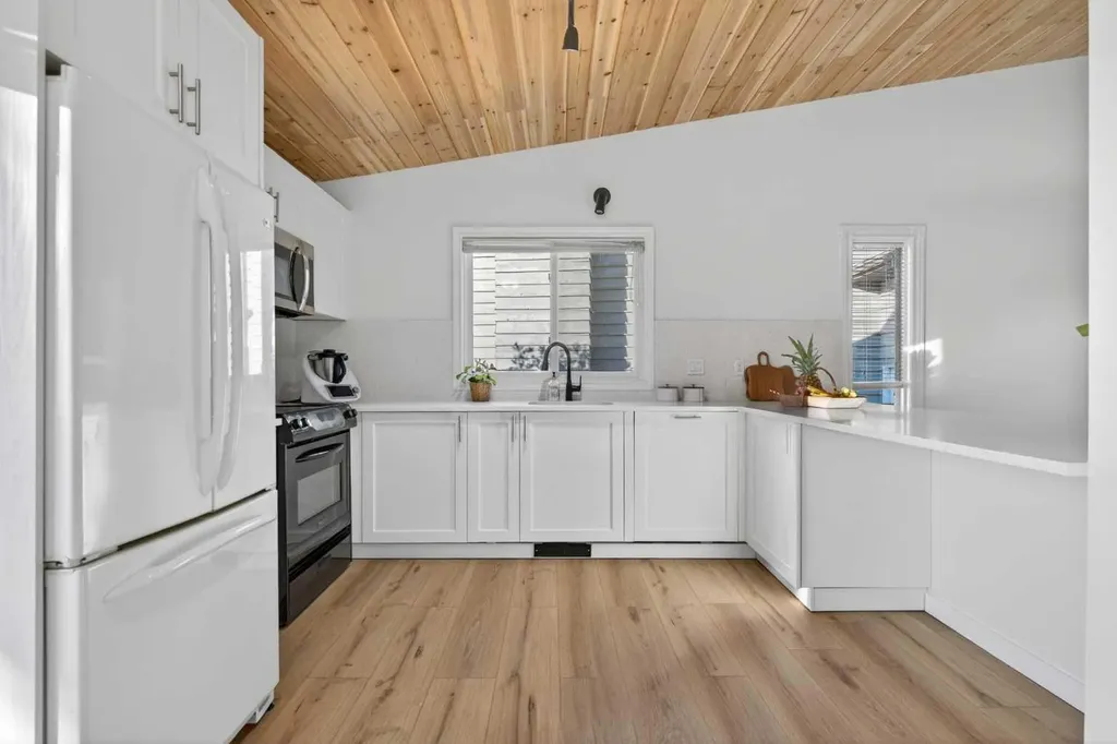 303 Woodside Place Okotoks AB T1S 1L9