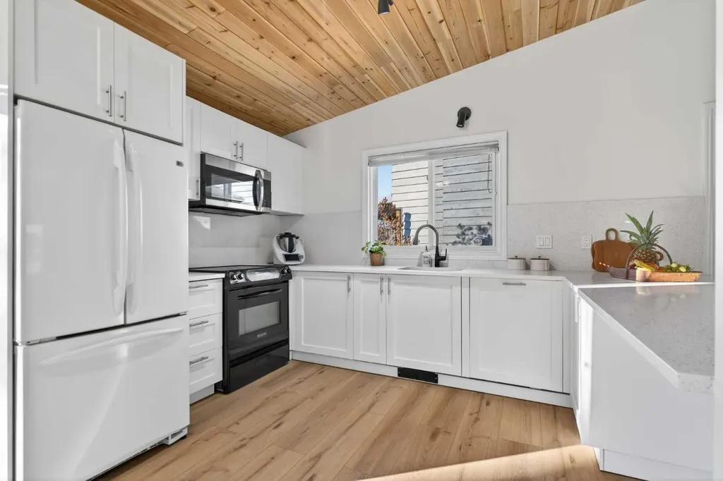 303 Woodside Place Okotoks AB T1S 1L9